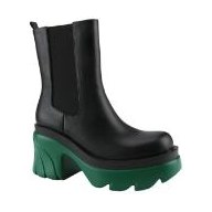 Look 050: black Chelsea boot with green lug sole